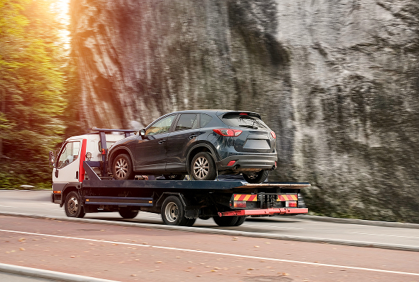 Why Your Vehicle’s Towing Method Matters: The Advantage of Flatbed Transport